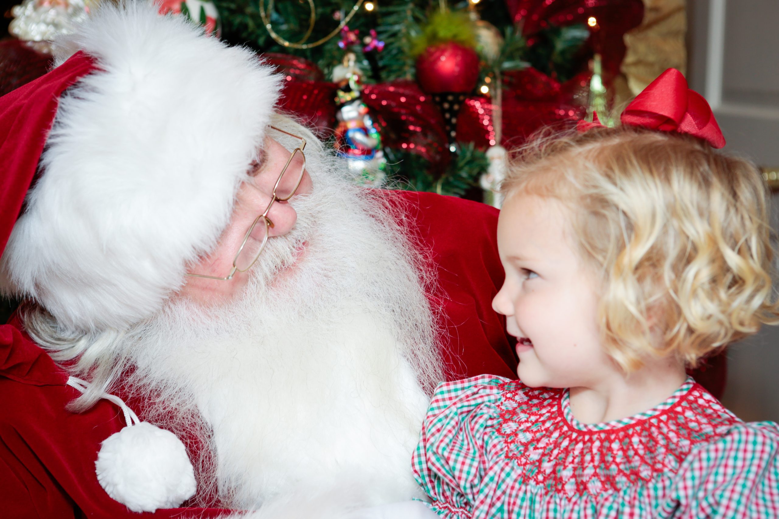 Santa sharing a moment with a child